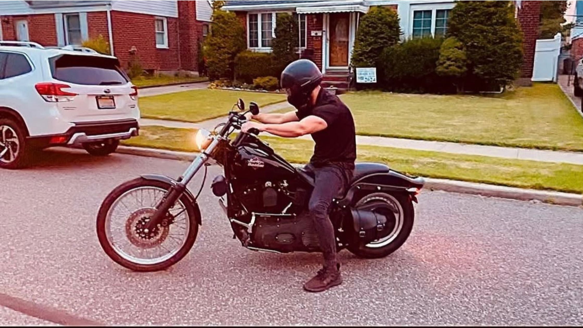 Chris McGrath riding a vintage 1999 Harley-Davidson Night Train motorcycle, showcasing nostalgic Long Island style and the Daddy Mustache lifestyle brand aesthetic.