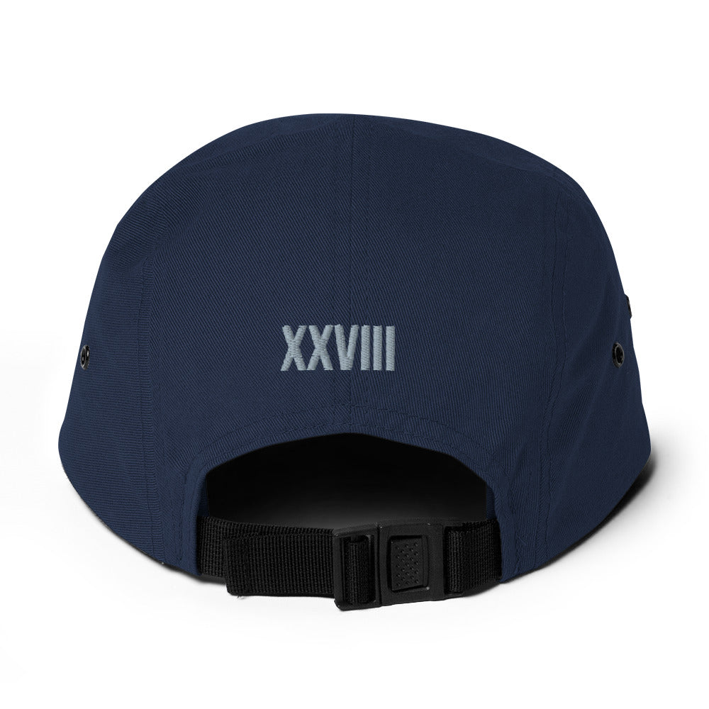 Navy blue cap with 'XXVIII' on the back against a white background