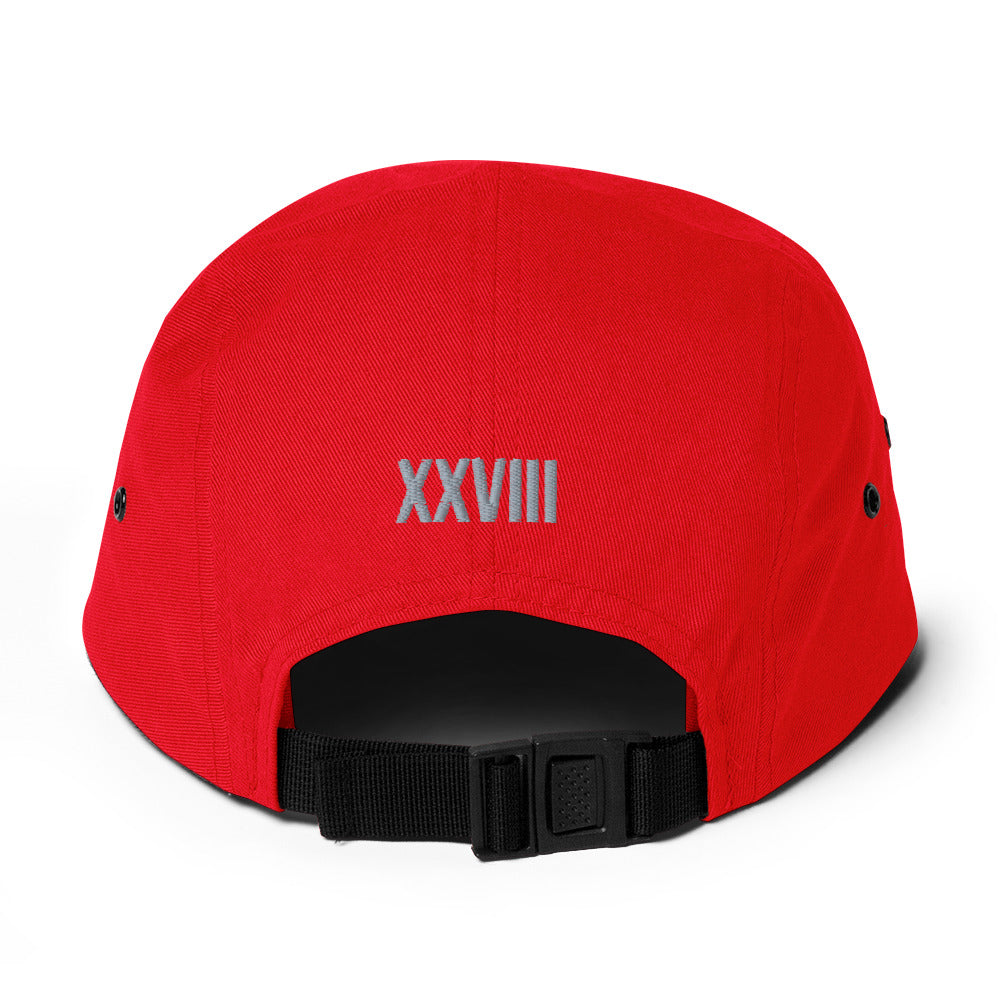 Red cap with 'XXVIII' on the back against a white background