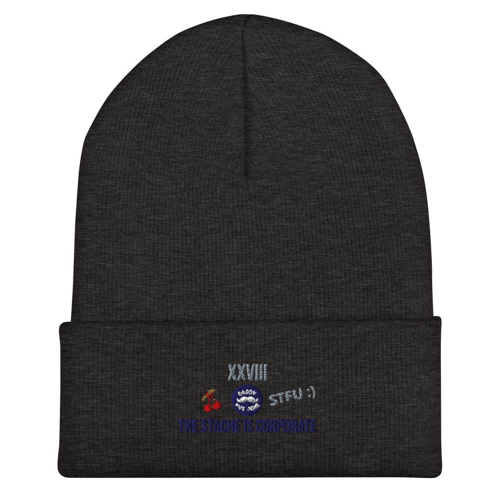 Dark gray beanie with embroidered text and symbols on a white background