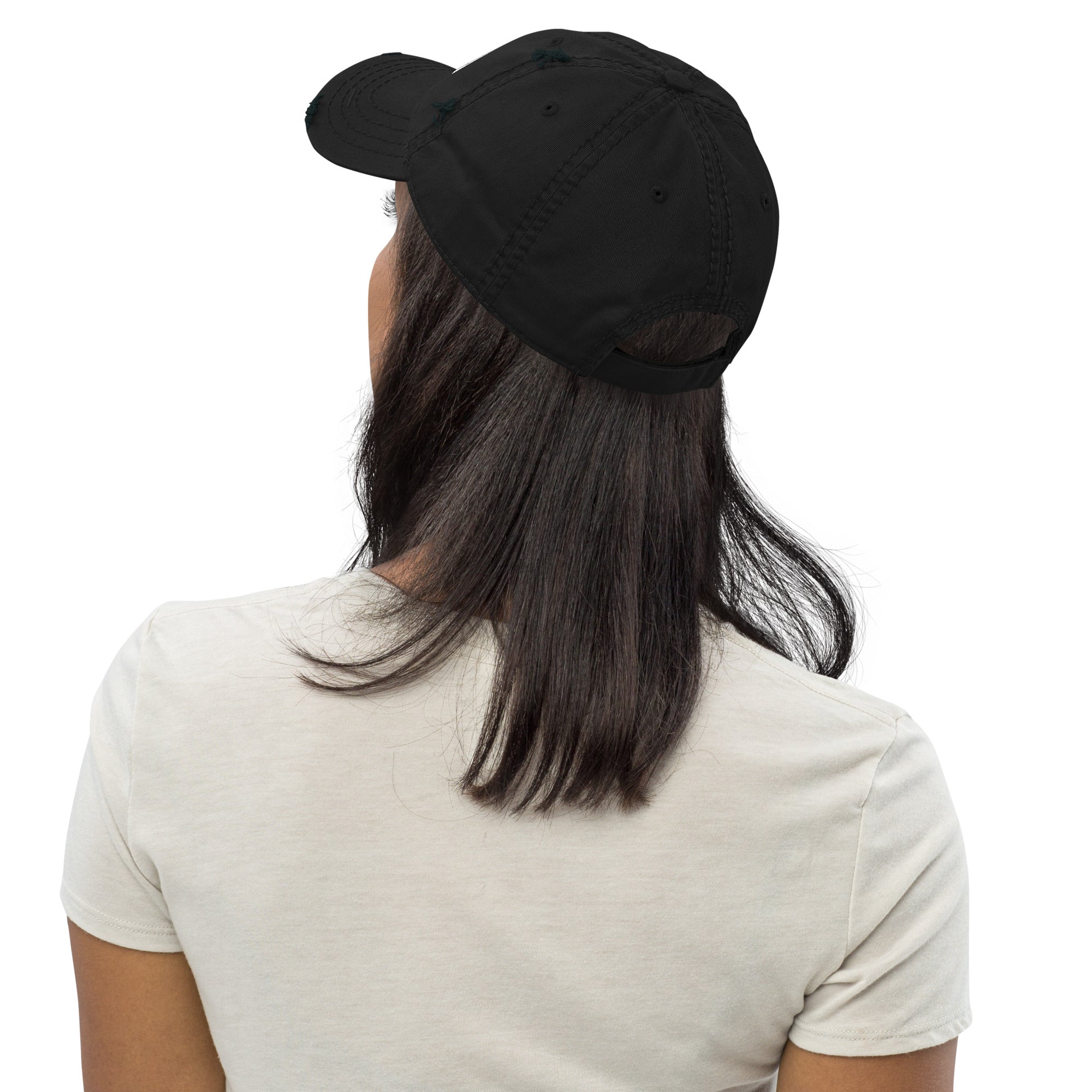 Person wearing a black cap from behind on a white background
