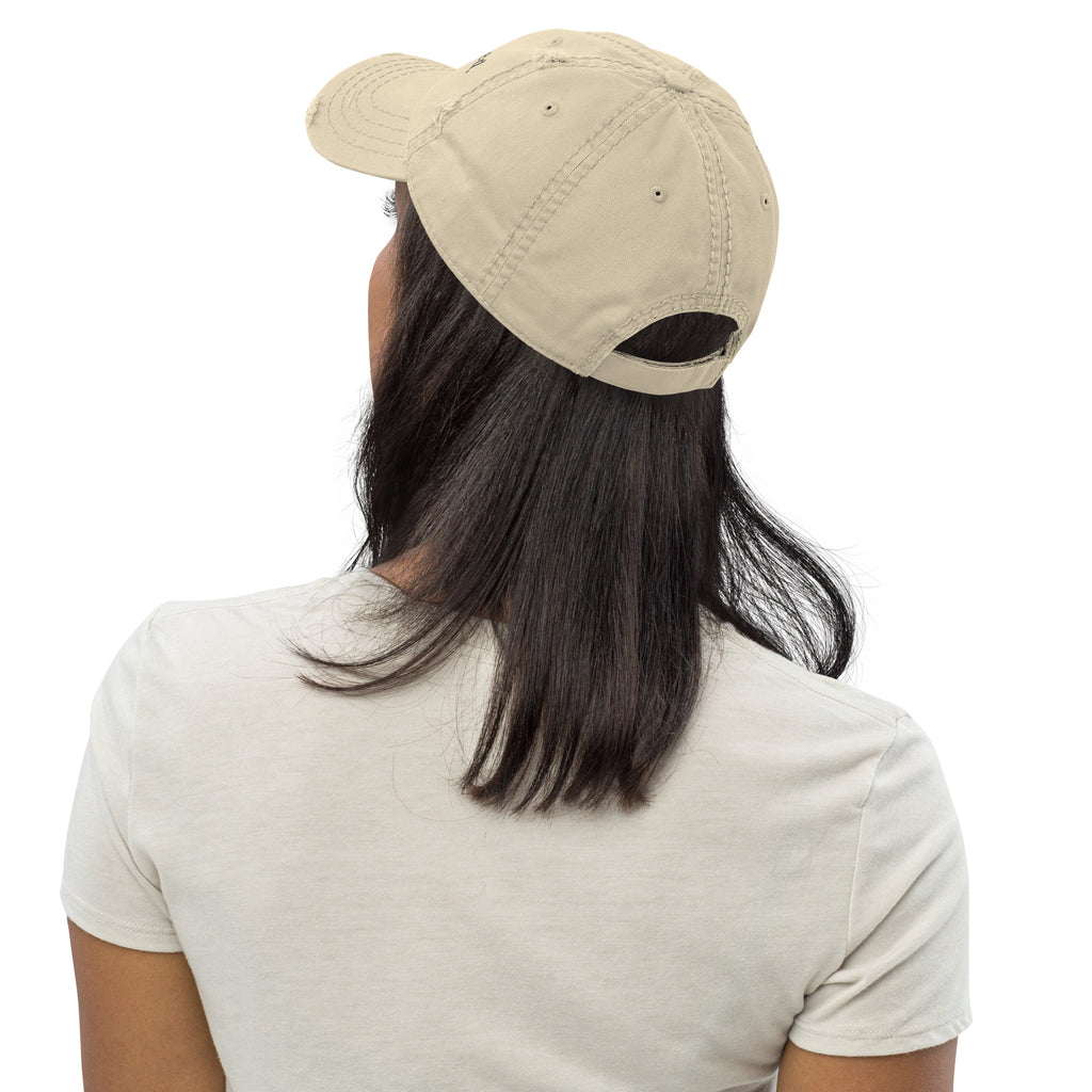 Person wearing a beige cap from behind on a white background