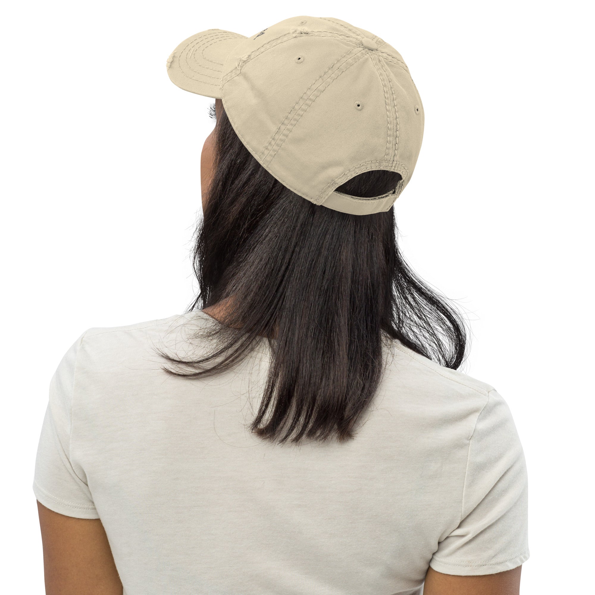 Person wearing a beige cap from behind on a white background