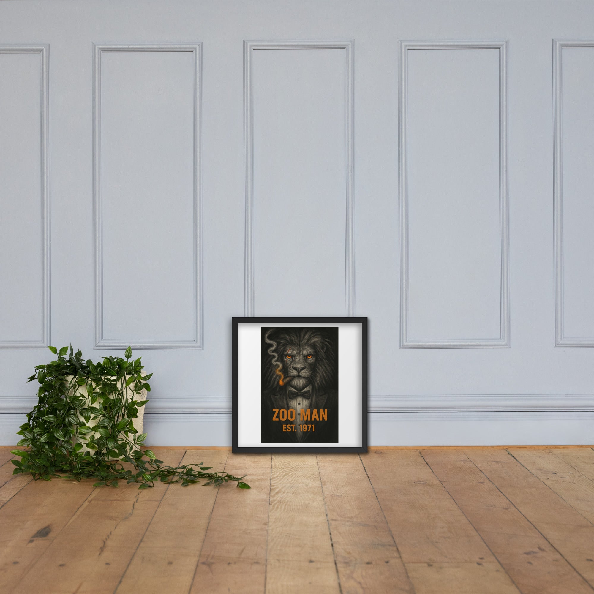 White chair and potted plant against a gray wall with framed artwork by Chris McGrath and his company Daddy Mustache.
