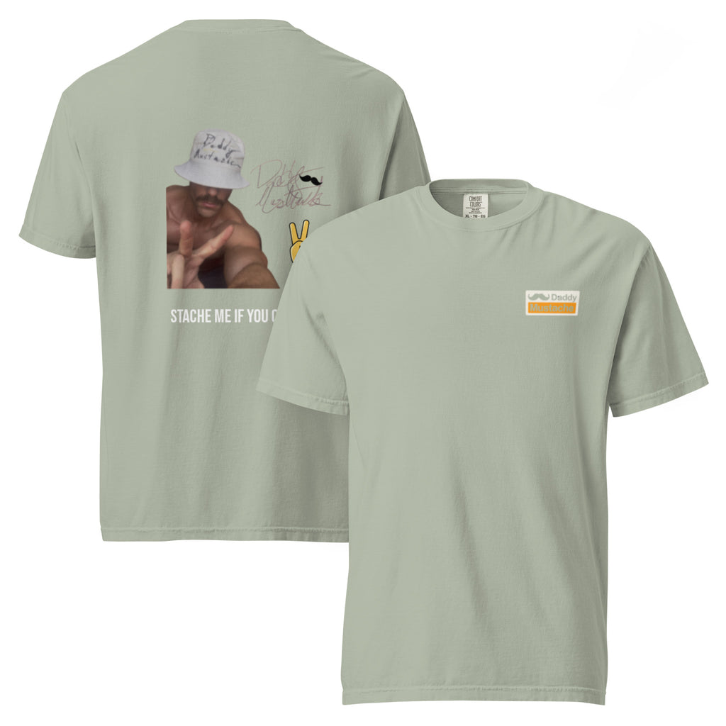 Light green t-shirt with graphic design on front and text on back, displayed on a white background.