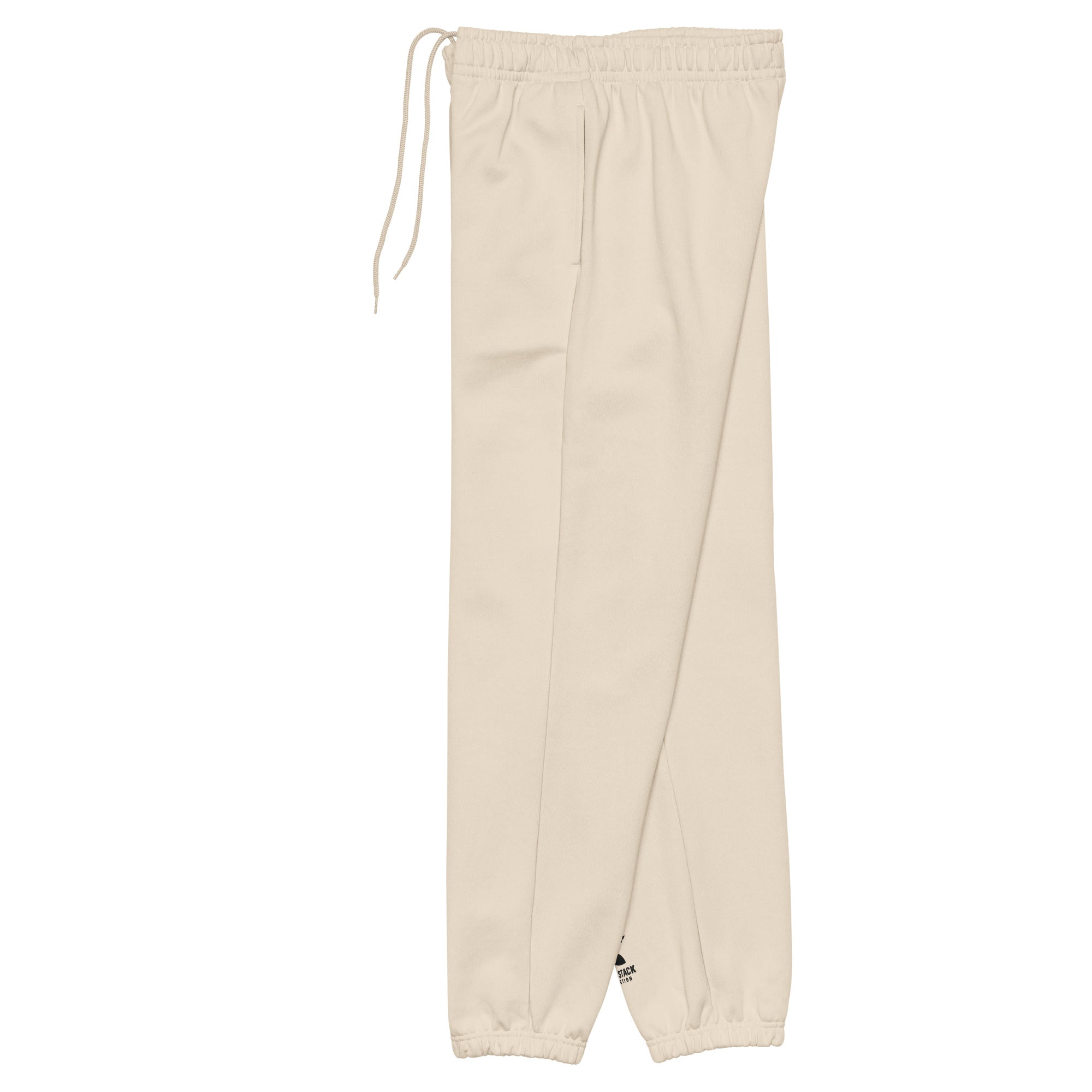 Beige sweatpants with drawstring on a white background
