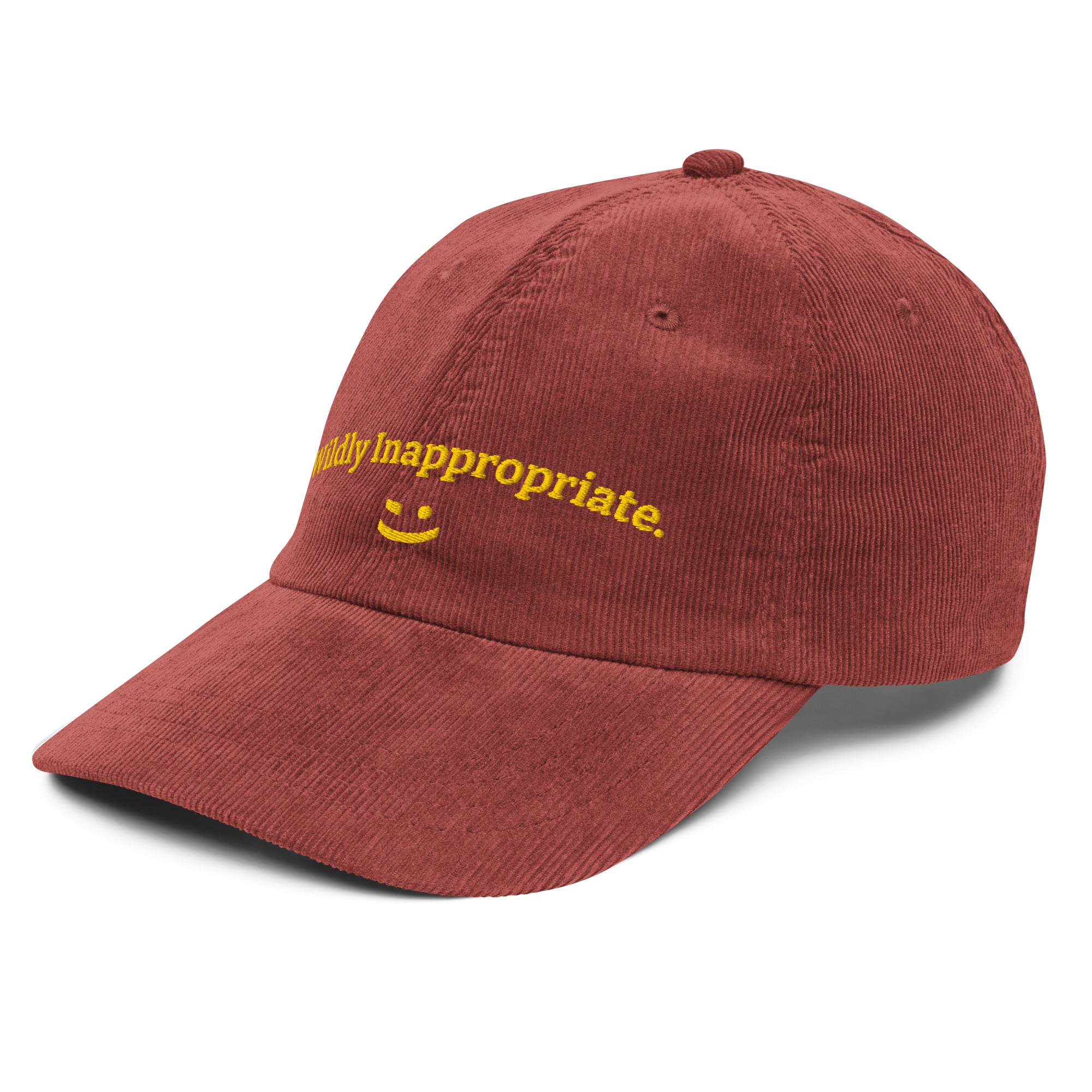 Red cap with yellow text and smiley face on a white background