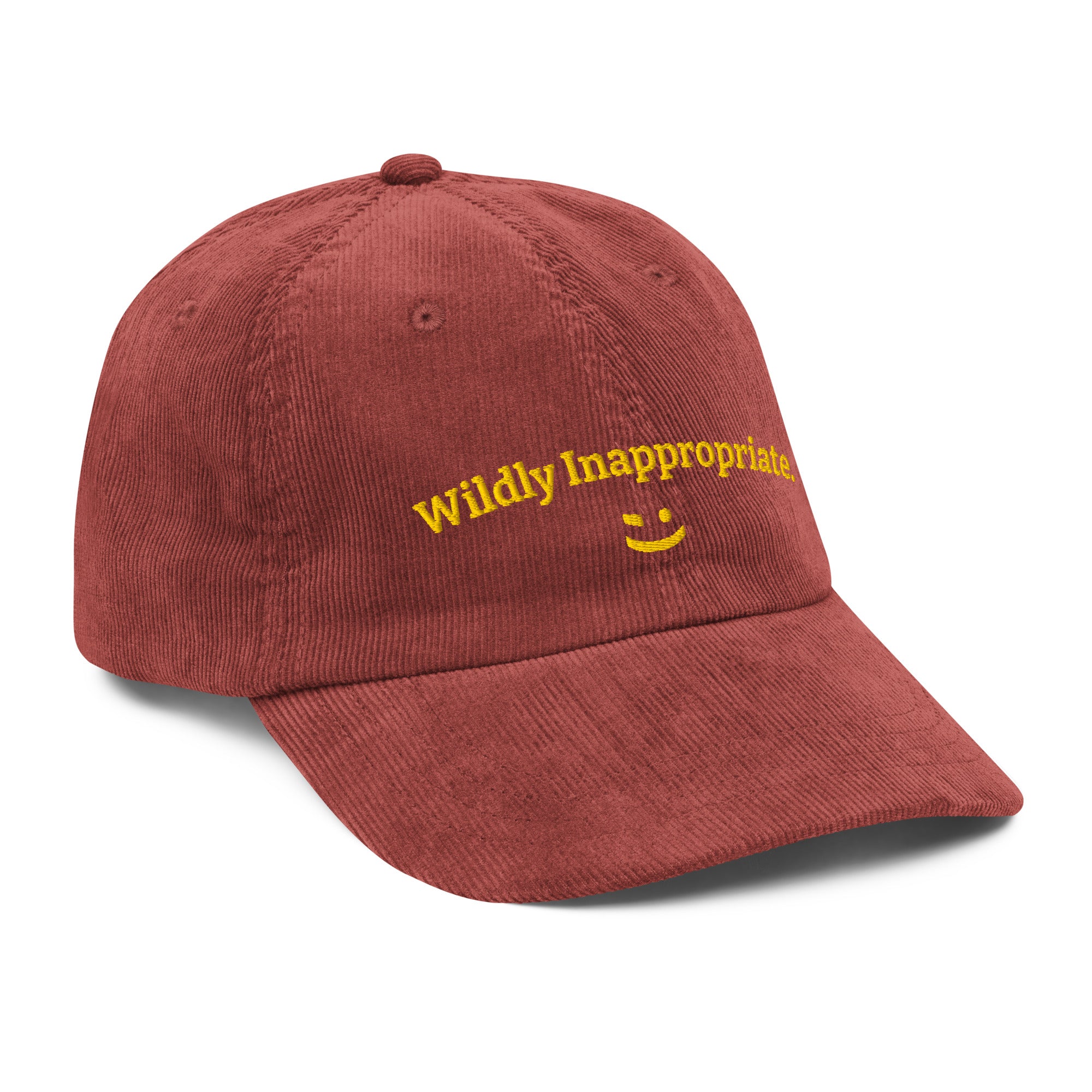 Red cap with yellow text and smiley face on a white background